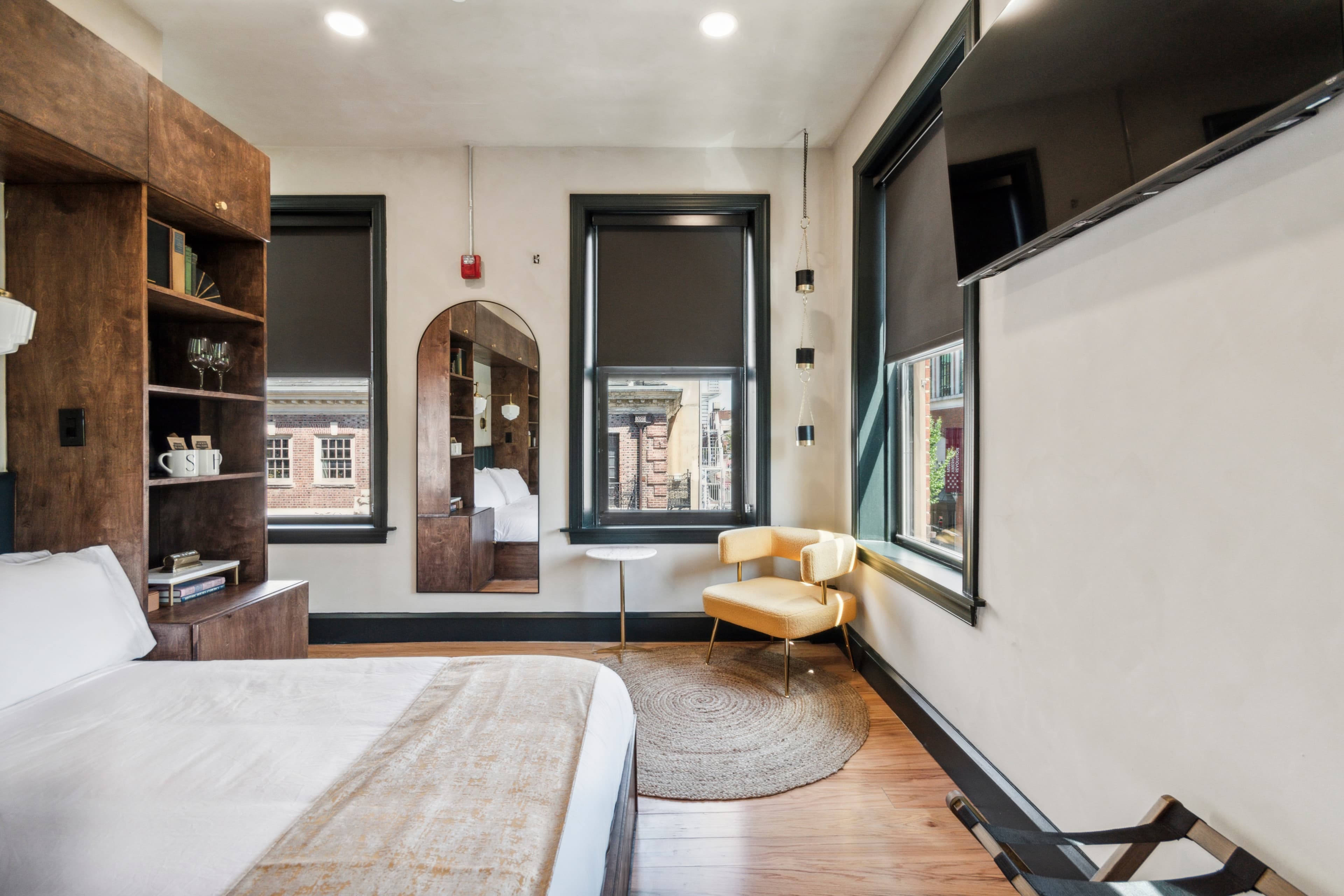 King room — brass-framed mirror detail