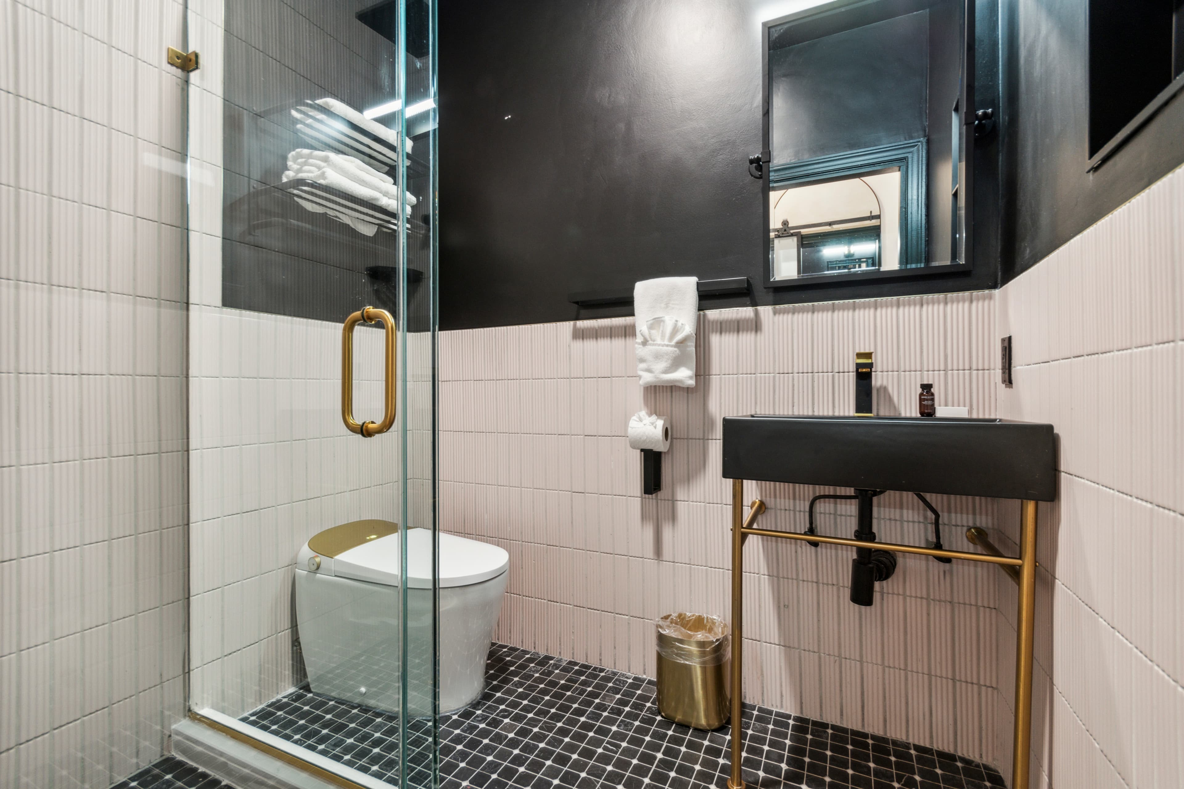 Queen room — black-and-white tile bath